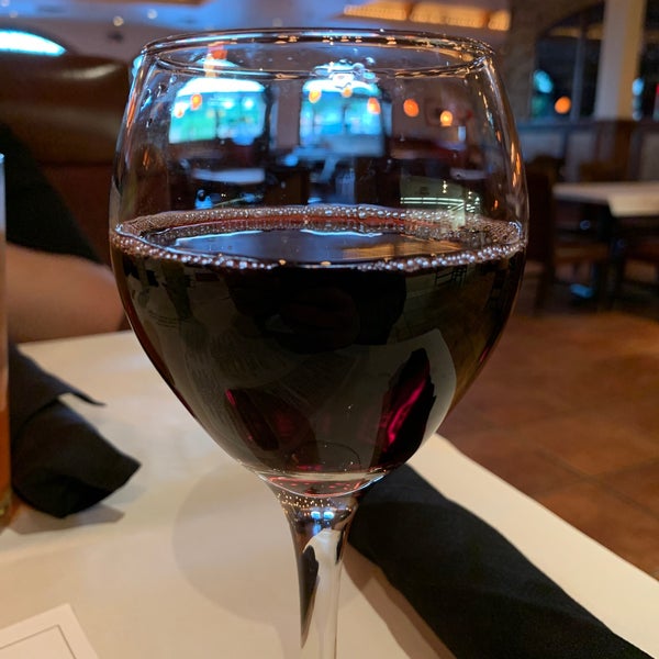 Photo taken at Romano&#39;s Macaroni Grill by Jonathan S. on 6/25/2020