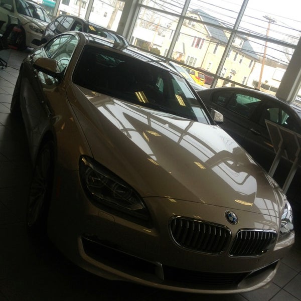 Photo taken at Ray Catena of Westchester, LLC BMW of Westchester by Wil S. on 1/25/2013