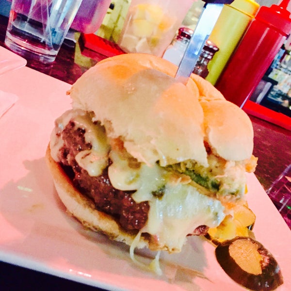 Photo taken at Flipside Burgers &amp; Bar by Wil S. on 2/17/2015