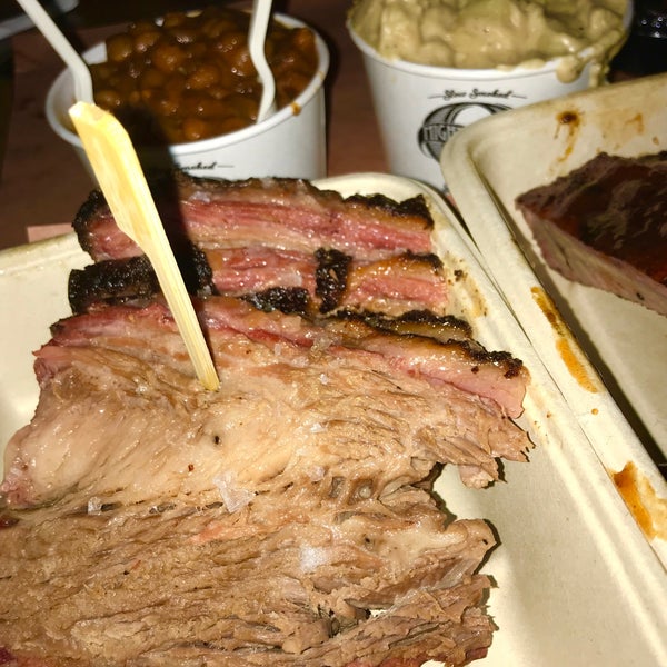 Photo taken at Mighty Quinn&#39;s BBQ by Grace B. on 9/29/2018