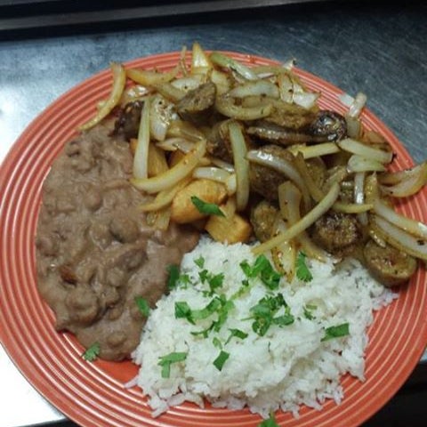try our Brazilian calabresa sausage with saute onions, yuca, rice and beans! Simply delicious!