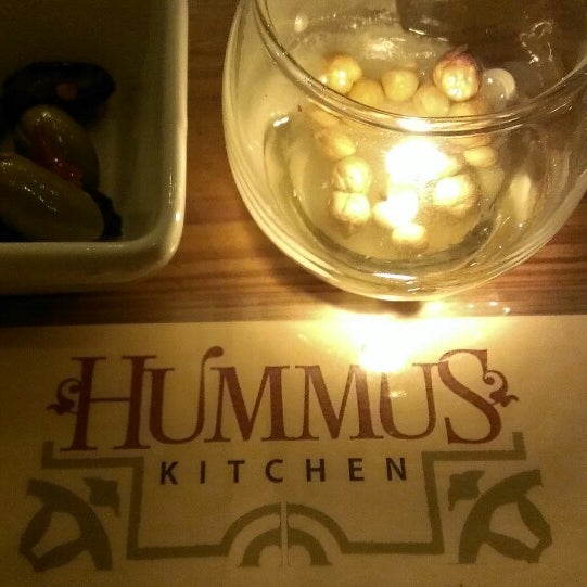 Photo taken at Hummus Kitchen by Amy T. on 3/6/2013
