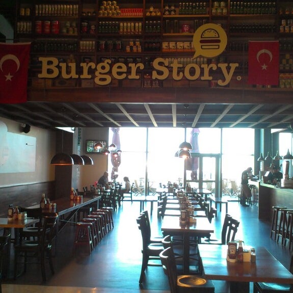 Photo taken at Burger Story by ESER A. on 4/23/2013