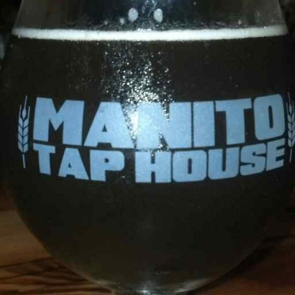 Photo taken at Manito Tap House by Mikel S. on 5/22/2013