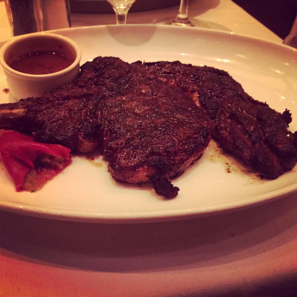 Photo taken at Bobby Flay Steak by Darwin A. on 2/10/2015