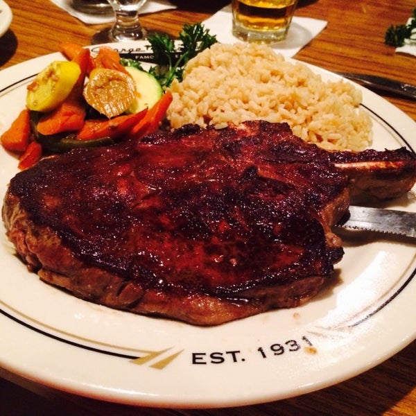 Photo taken at George Petrelli Steak House by CMari on 5/1/2014