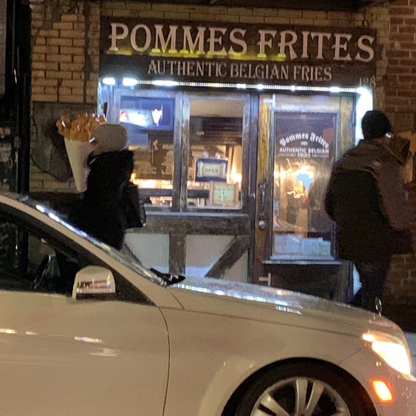 Photo taken at Pommes Frites by April N. on 12/18/2019