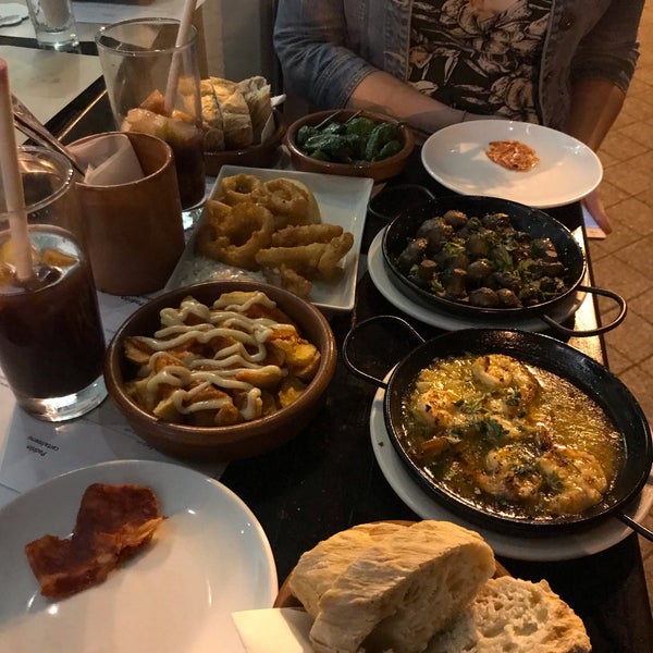 Beautiful sangria, Padron peppers and garlicky prawns!