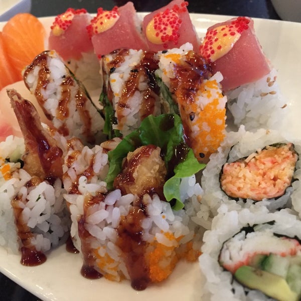 Photo taken at Sushi + Rotary Sushi Bar by john B. on 11/15/2014