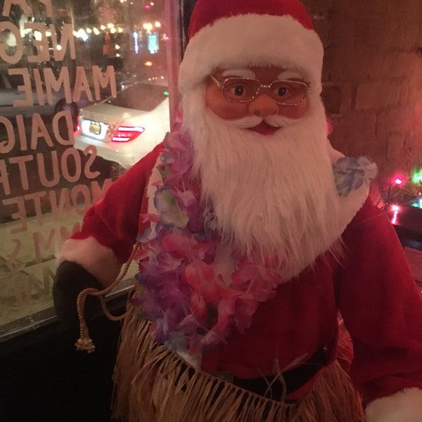 Photo taken at Sippin&#39; Santa&#39;s Surf Shack by Caitlin C. on 12/3/2017