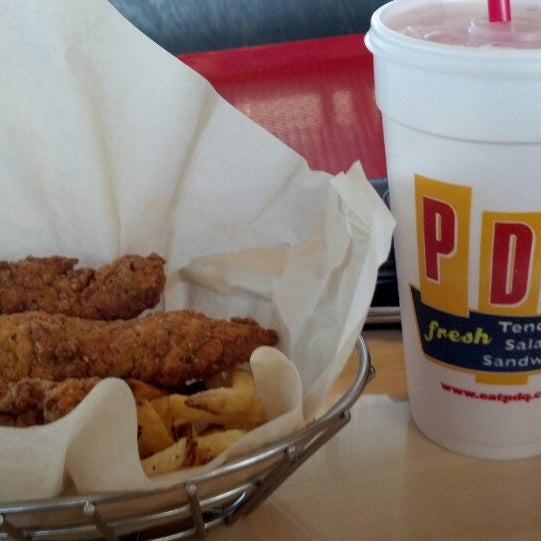 Photo taken at PDQ by Leesa F. on 4/7/2013
