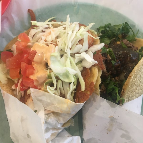 Photo taken at The Taco Stand Downtown by Katie B. on 6/30/2018