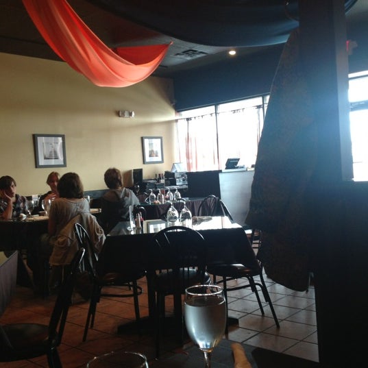 Photo taken at Sitara Indian Restaurant by Kinsey S. on 10/13/2012