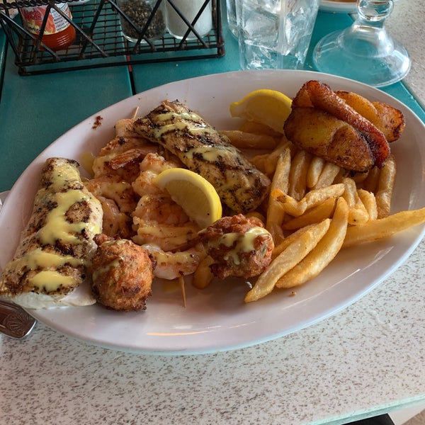 Photo taken at Seabreeze Island Grill by Branden D. on 8/11/2019