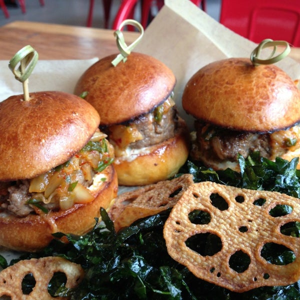 Get the Kimchi Sliders! They are as delicious as they are pleasing to the eye. They come with homemade crispy seaweed and lotus chips.