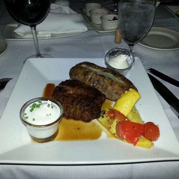Photo taken at Russell&#39;s Steaks, Chops, &amp; More by Leon S. on 2/15/2013