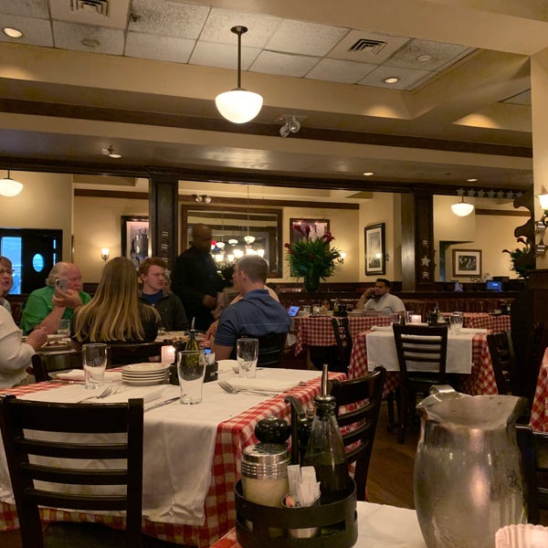 Photo taken at Maggiano&#39;s Little Italy by Sergio E. on 7/9/2019