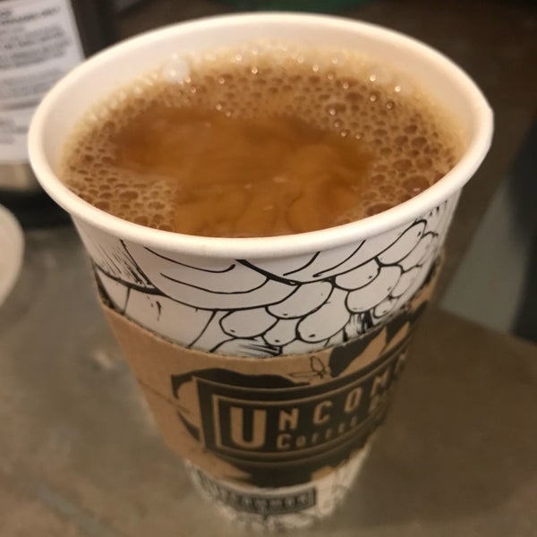 Photo taken at Uncommon Coffee Roasters by Michael R. on 5/13/2018