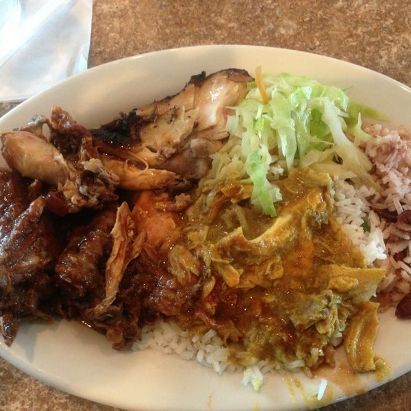 Photo taken at Jamaica Gates Caribbean Restaurant by John J. on 5/23/2013