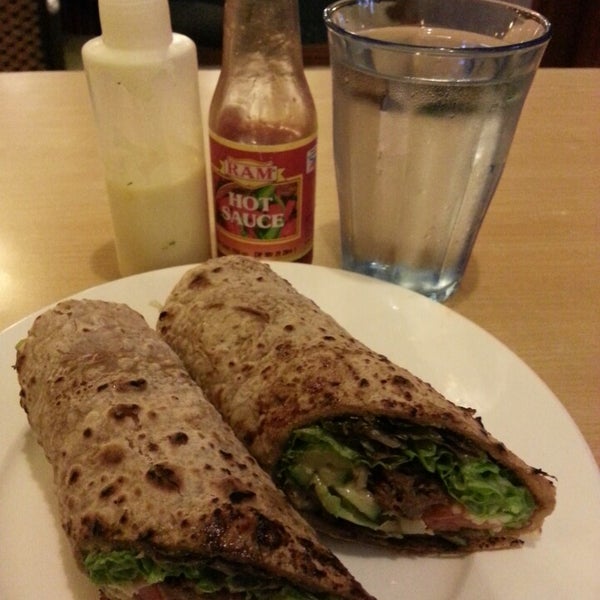Photo taken at Greens Plant Based Restaurant and Café by jo-anne l. on 3/28/2013