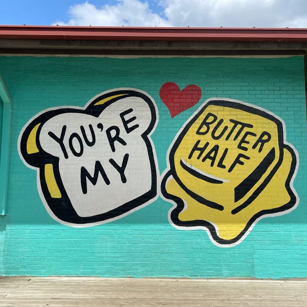 Photo taken at You&#39;re My Butter Half (2013) mural by John Rockwell and the Creative Suitcase team by Sydney R. on 8/28/2021