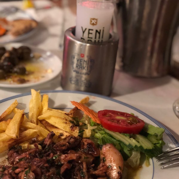 Photo taken at Neighbours Restaurant by Emre S. on 7/19/2018