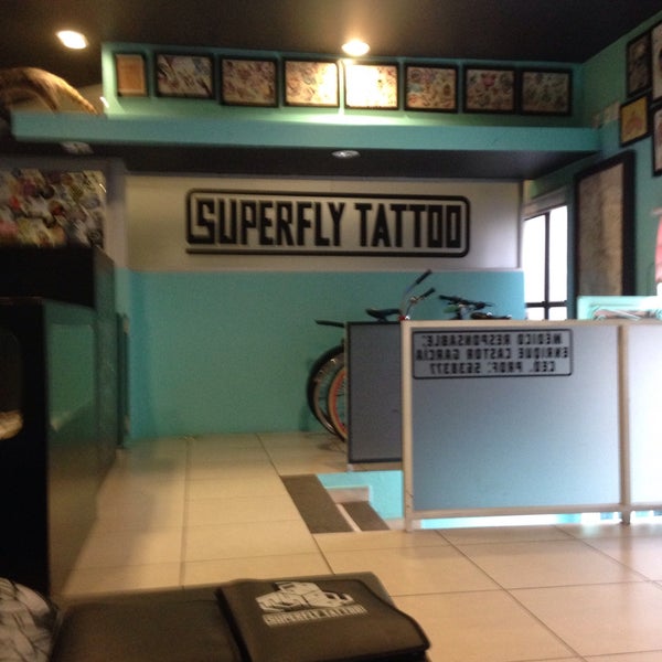 Photo taken at Superfly tatuajes by Mmmm A. on 1/26/2015
