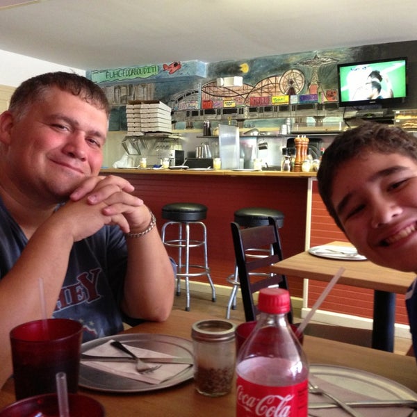 Photo taken at Coney Island Pizza by Melissa B. on 8/25/2013