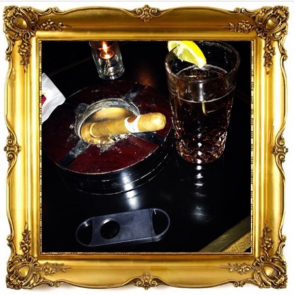 3/1/2014にKells B.がMerchants Cigar Barで撮った写真