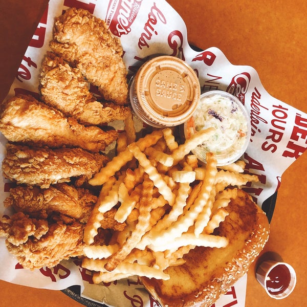 Photo taken at Raising Cane&#39;s Chicken Fingers by Chi C. on 12/5/2018