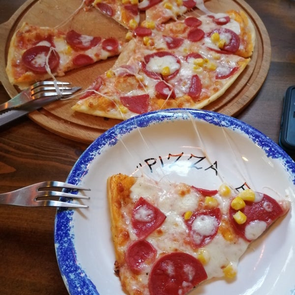 Photo prise au Pizza Napoli par Tolga le7/30/2019