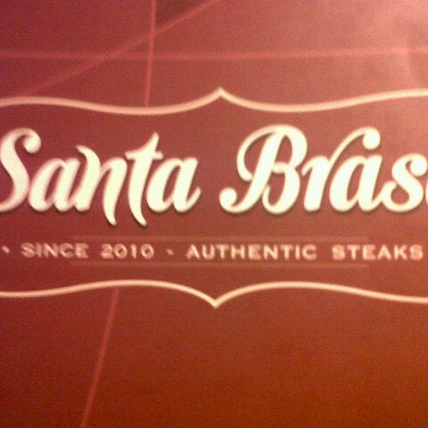 Photo taken at Santa Brasa Authentic Steaks by Daniel Vinicius S. on 5/25/2013