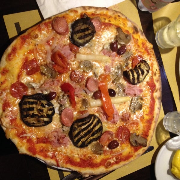 Photo taken at Pizzeria - Cicchetteria &quot;Alla Strega&quot; by Lalula P. on 2/22/2014