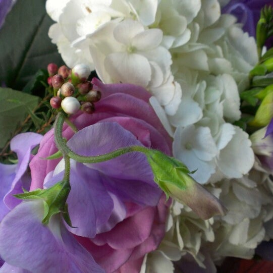 Photo taken at Classics Flowers and Confections by Chelsea L. on 3/5/2013