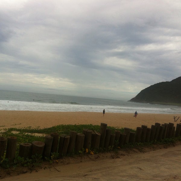 Photo taken at Praia da Silveira by Natasha R. on 2/21/2016