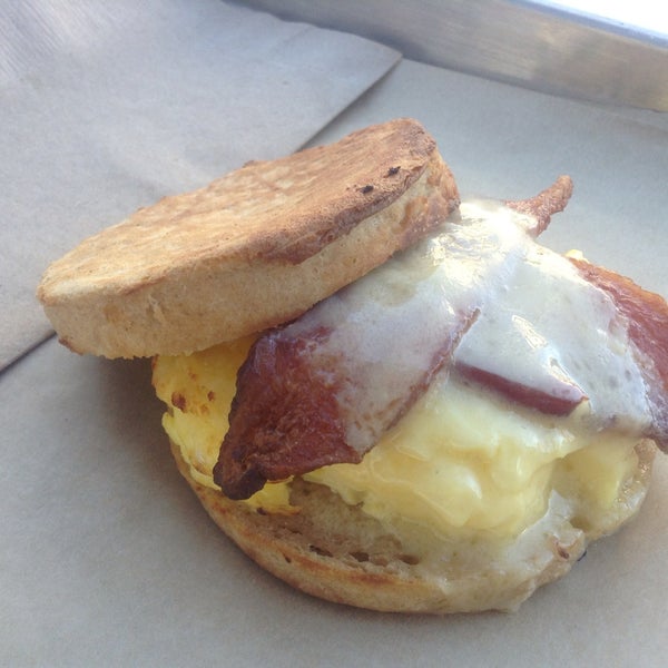 Love the breakfast sandwich piled high with creamy scrambled eggs and bacon with the tastiest house made muffin - just delicious