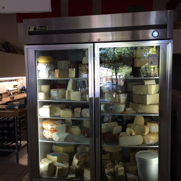 Photo taken at Vivant Fine Cheese by Nicole M. on 10/3/2015