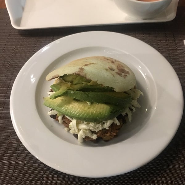 Highly recommend this place. Staff is lovely and food marvelous. Ordered  black beans and shredded beef arepa, and was incredible good, added avocado(free of charge). Cant get cheaper than it is($).