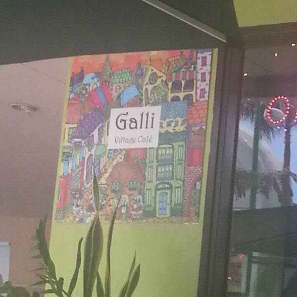 Photo taken at Galli Village Cafe by Darci A. on 3/27/2013