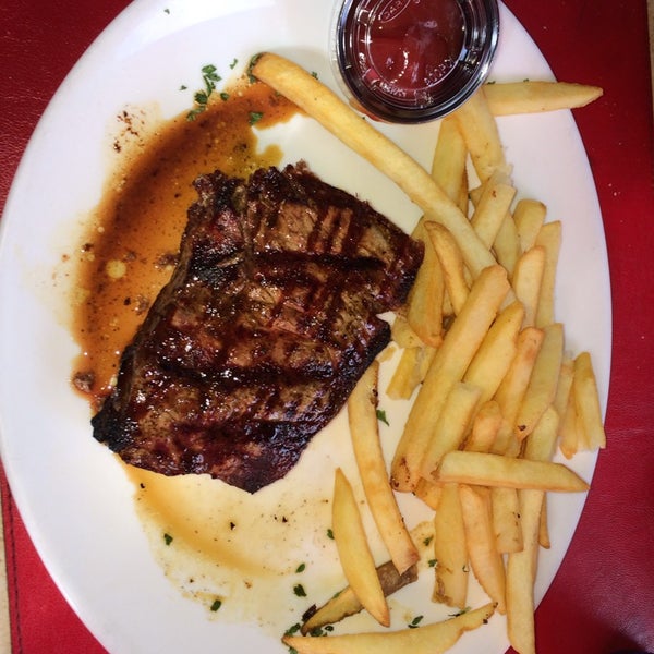 Photo taken at Angus Steak House by Juan Pablo C. on 2/9/2014