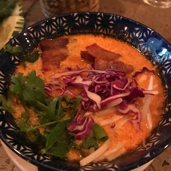 Photo taken at Bida Manda Laotian Restaurant and Bar by Minh N. on 5/23/2018
