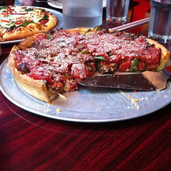 Photo taken at Kylie&#39;s Chicago Pizza by George B. on 5/15/2014