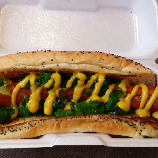 Photo taken at Greatest American Hot Dogs by Ben W. on 4/12/2014