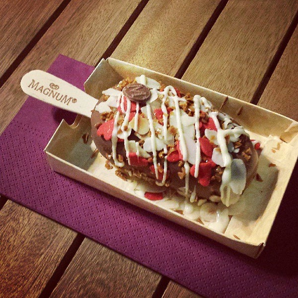 Photo taken at Magnum Singapore Pleasure Store by Ynez L. on 8/6/2013