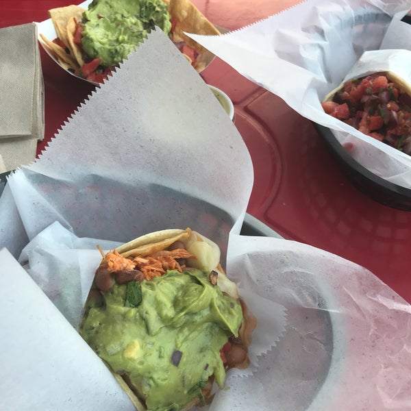 Photo taken at Nick&#39;s Crispy Tacos by Brittany G. on 4/18/2018