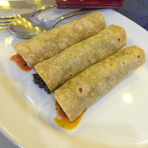 Photo taken at Restaurante La Romería by Daniela C. on 1/2/2015