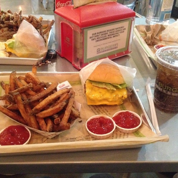 Photo taken at BurgerFi by Hothaifa on 11/24/2014