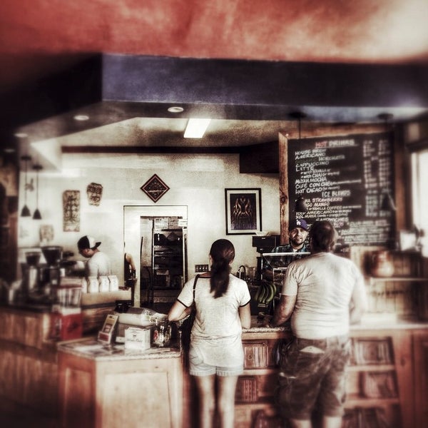 Photo taken at Antigua Coffee House by Peter L. on 10/4/2014