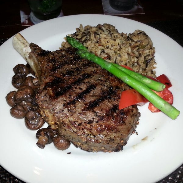 Photo taken at The Keg Steakhouse + Bar - Las Colinas by Hugh L. on 8/3/2013