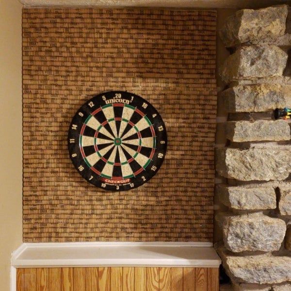 After 2 trips to Florida from Kentucky, 550 corks cut in half, and 16 hours of work, our Vino Florida cork board for our dart board, is complete!
